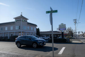 A motorist passes by the former location of Surro Connections, which was once a reputable surrogacy agency that operated out of Camas, on Jan. 23. The agency abruptly closed late last year, leaving clients without access to the tens of thousands of dollars needed to pay the surrogates carrying their children. The whereabouts of the company&rsquo;s founder, Megan Hall-Greenberg, are unknown. (Amanda Cowan/The Columbian files photos)