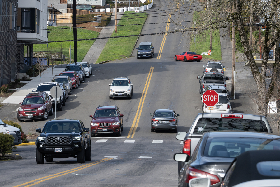 Drivers pass parallel parking spots along Northeast Dallas Street in Camas on Friday afternoon, Feb. 6, 2026. The city of Camas is proposing the addition of 55 downtown parking spaces due to the upcoming construction of a new fire station. (Amanda Cowan/The Columbian)