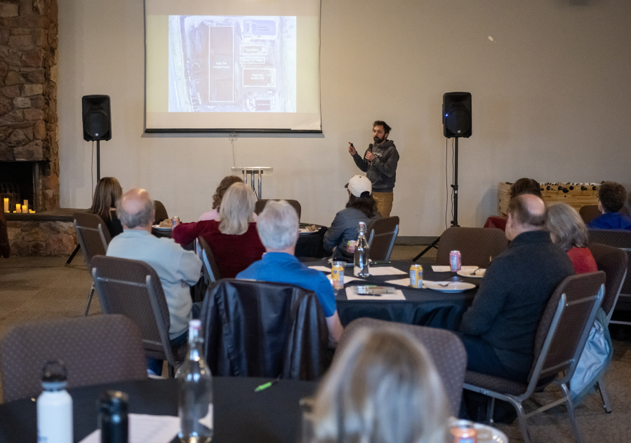 Dirt Hugger cofounder Pierce Louis gives a presentation at Clark County&rsquo;s We Compost program&rsquo;s Thursday celebration at Real Life Foursquare Church in Vancouver. (Taylor Balkom/The Columbian)