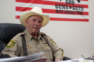 Klickitat County Sheriff Bob Songer sits in his office in Goldendale on July 5, 2023. (Isaac Stone Simonelli/ Arizona Center for Investigative Reporting)