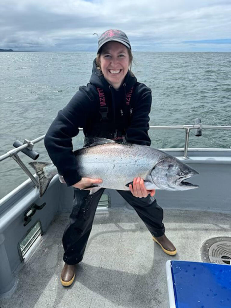 Ocean salmon seasons will start in June. Here a happy angler shows off a fine chinook salmon taken with Sea Breeze Charters. (Photo courtesy Sea Breeze Charters)