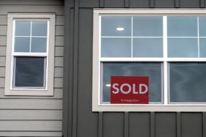 A &ldquo;sold&rdquo; sign is pictured in a new Harmony Heights neighborhood home on Feb. 15. Clark County saw more homes for sale in January than it did the year before. (Amanda Cowan/The Columbian)