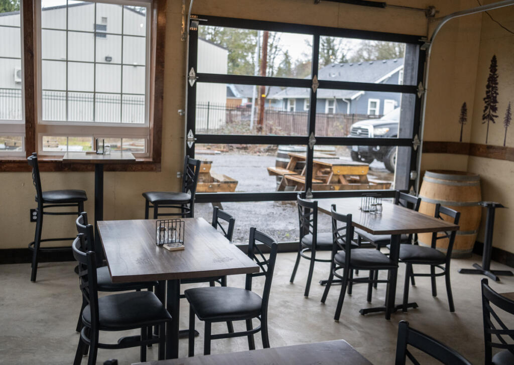 Chairs and tables sit in a dining room Monday, Feb. 23, 2026, at Shoug&rsquo;s Draft House in Washougal. (Taylor Balkom/The Columbian)