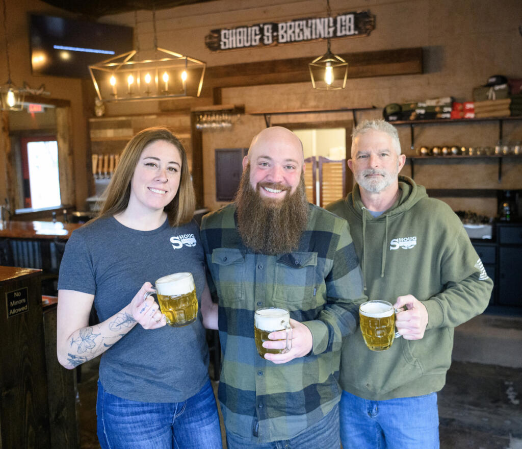 *LEADOPTION* Executive chef Jess Borth, from left, owner and director of business operations Jon Borth, and Owner and head brewer stand for a portrait Monday, Feb. 23, 2026, at Shoug&rsquo;s Draft House in Washougal. (Taylor Balkom/The Columbian)