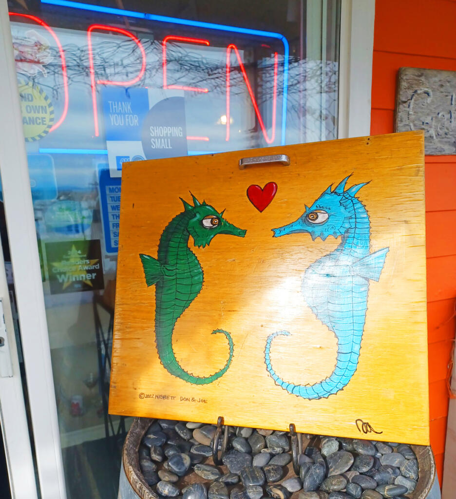 This handpainted seahorse sign welcomes guests into the Don Nesbitt Art Gallery. Shoppers will find an array of original art, coasters, mugs and painted glassware. (Monika Spykerman/The Columbian)