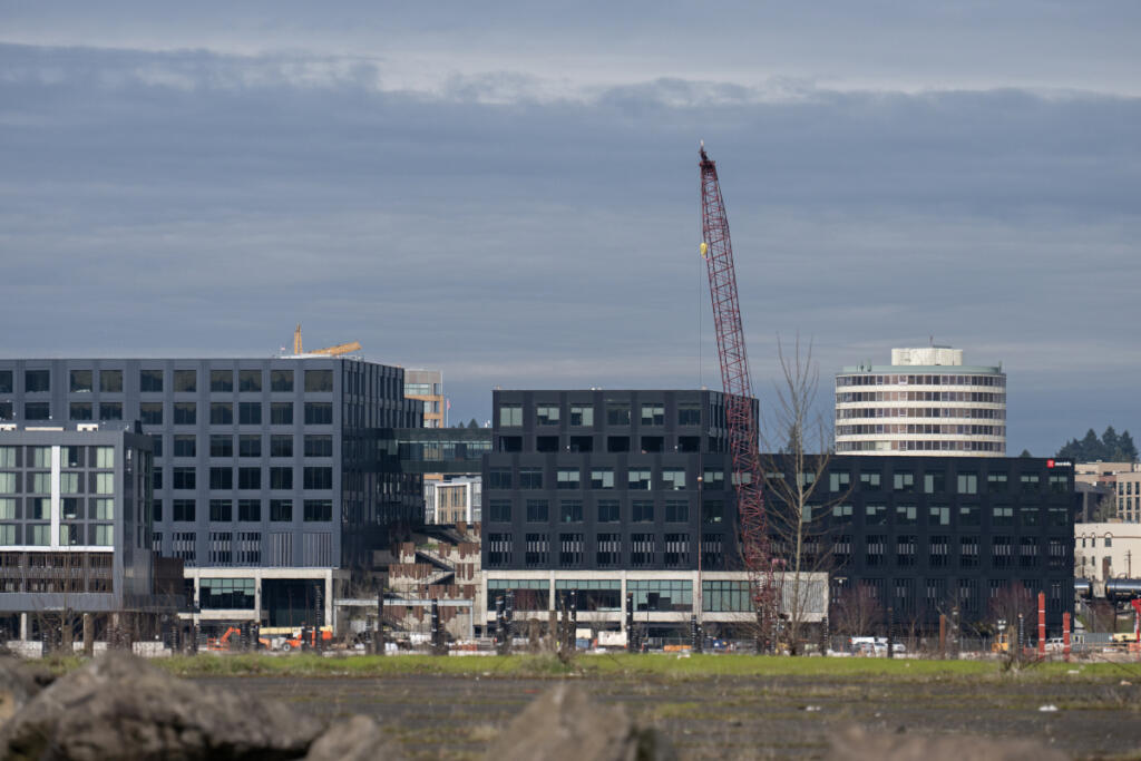 The Vancouver skyline is visible from the east side of the Willamette River on Tuesday. (Amanda Cowan/The Columbian)