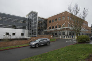 A motorist drives past the Clark County Public Health building on Feb. 5, 2020. The Clark County Council is asking the Legislature to protect funding for public health services. (Amanda Cowan/The Columbian files)