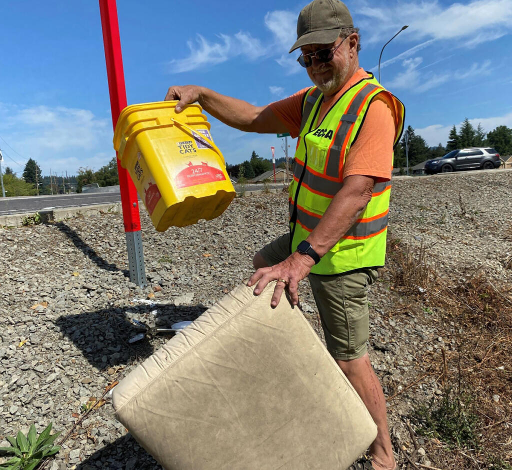 Camas resident Mark Silliman picks up trash from the side of state Highway 14 in Clark County on Sept. 10, 2023. (Photos contributed by Melanie Wilson)