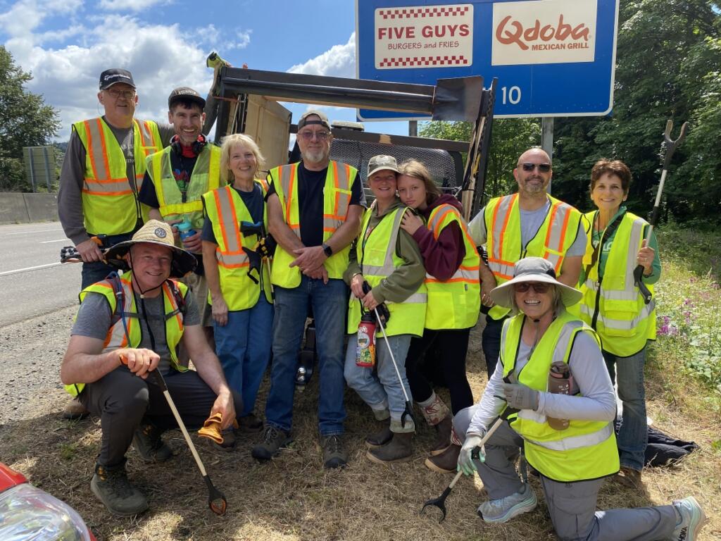 East County Citizens&rsquo; Alliance volunteers pose for a photo while picking up trash from the side of state Highway 14 in east Clark County on June 28. (Melanie Wilson)