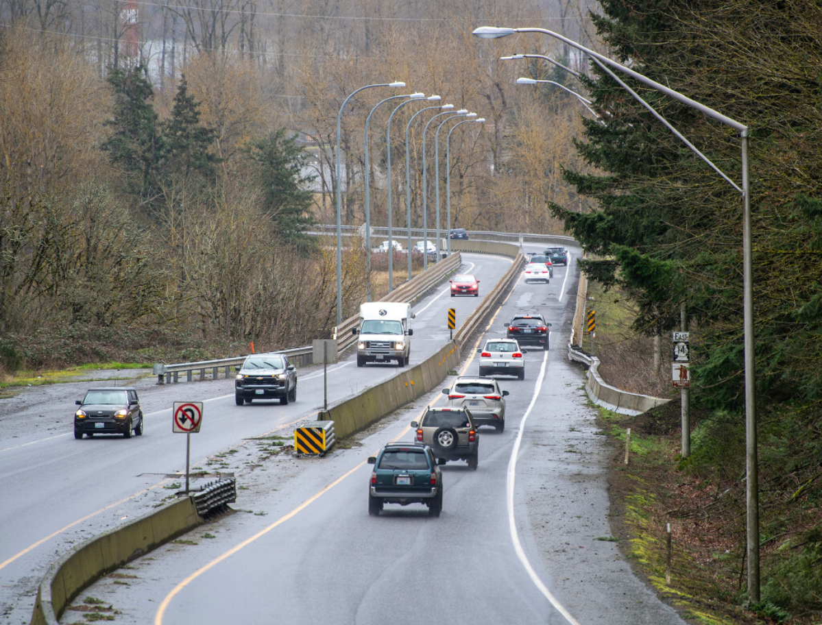 Traffic moves over the state Highway 14 bridge that crosses the Camas Slough on Feb. 25, 2025. Washington legislature rejected a request to fund a new bridge (Taylor Balkom/The Columbian files)