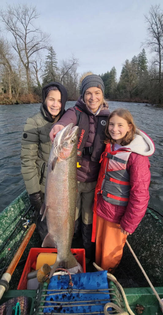 A fine Washougal River steelhead is displayed by lucky anglers. Several stakeholders recently met to at the Skamania Hatchery to discuss the upcoming closure of the facility. (Photo courtesy of Harry Barber)