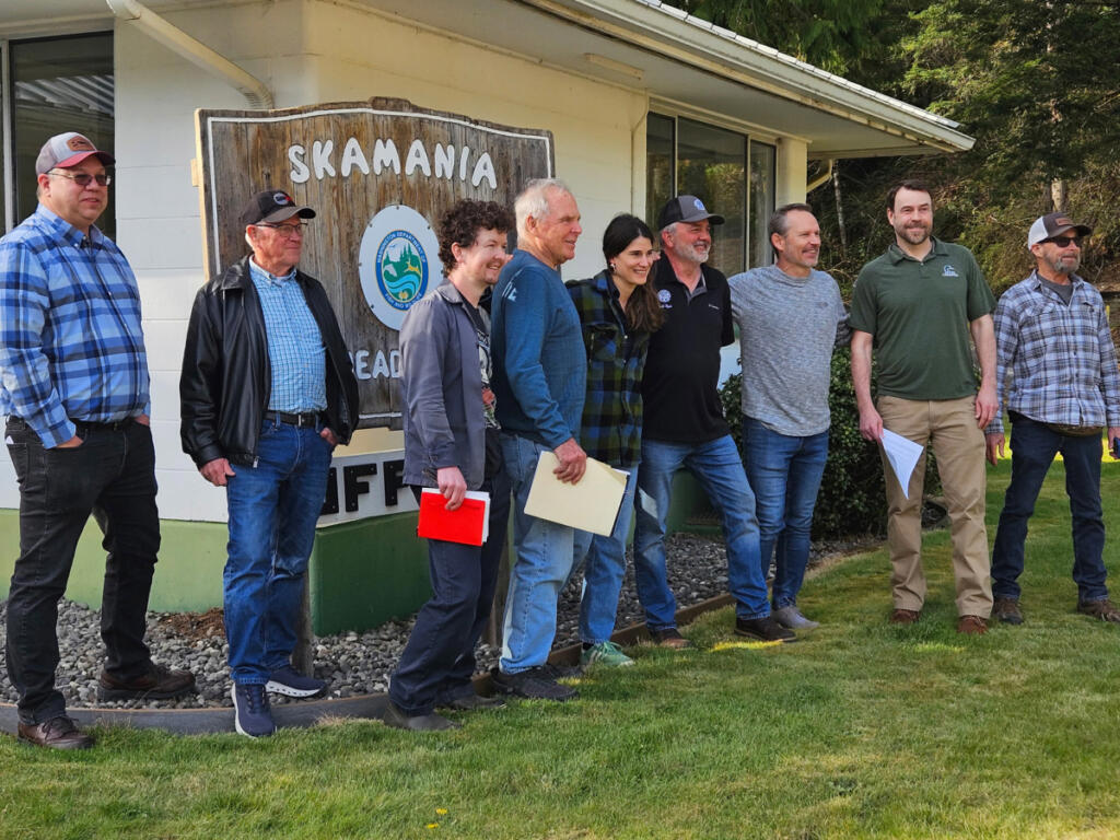 Participants in a meeting with Rep. Marie Gluesenkamp Perez, D-Skamania, center in plaid shirt, pose for a picture at the Skamania Hatchery.
From left: Skamania County councilor Brian Nichols and his friend; local anglers Andrew Dunworth and Harry Barber; Perez; Keith Hyde of NW Steelheaders; Nello Picinich, CCA; Clark County councilor and Ducks Unlimited policy director Matt Little; and local angler Ralph Ford. (Terry Otto for The Columbian)