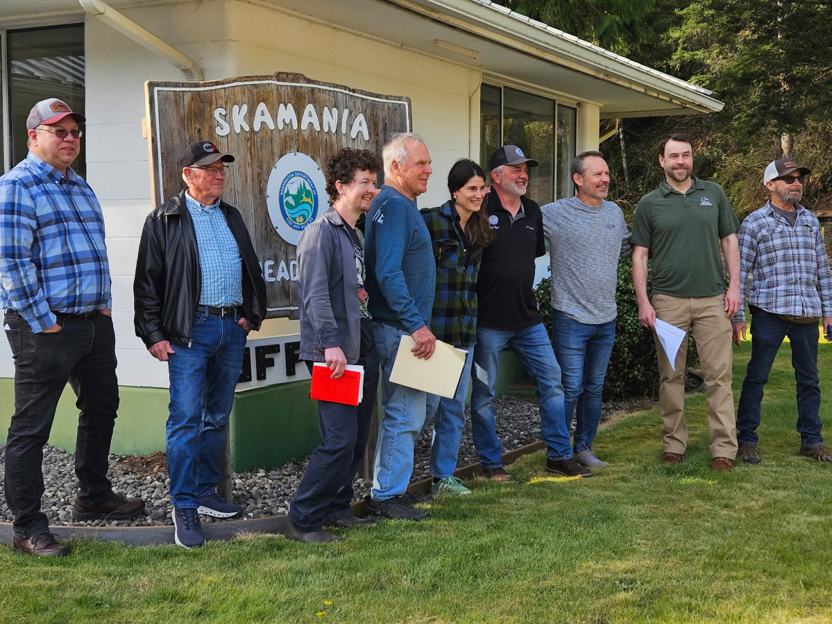 Participants in a meeting with Rep. Marie Gluesenkamp Perez, D-Skamania, center in plaid shirt, pose for a picture at the Skamania Hatchery.
From left: Skamania County councilor Brian Nichols and his friend; local anglers Andrew Dunworth and Harry Barber; Perez; Keith Hyde of NW Steelheaders; Nello Picinich, CCA; Clark County councilor and Ducks Unlimited policy director Matt Little; and local angler Ralph Ford. (Terry Otto for The Columbian)