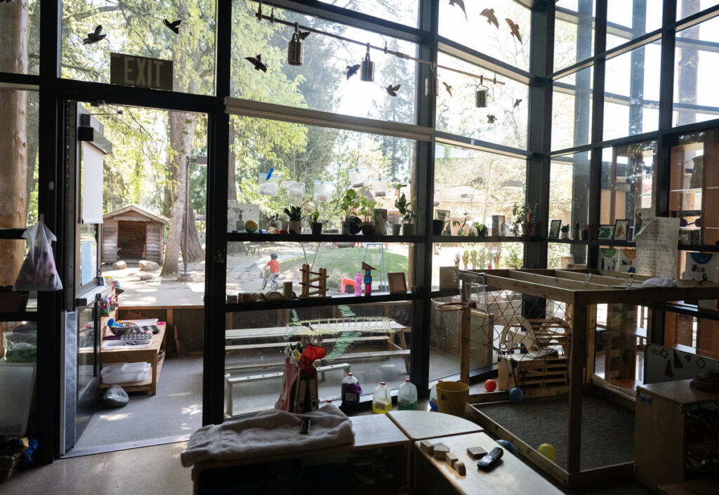 A preschool classroom opens up into an outdoor play area Thursday morning at the Oliva Family Early Learning Center and lab school in the Child and Family Studies area. Parents who enroll their kids at the center are also enrolling in a parent education class, where they learn positive discipline, get support, and can ask questions about child development and parenting strategies, said Rose Witteveen, the Child and Family Studies director of educational services. (Photos by Taylor Balkom/The Columbian)