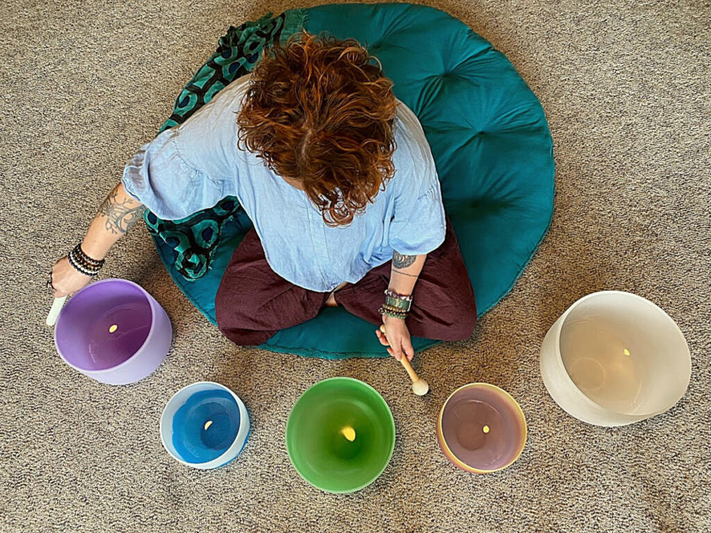 Rachel Fouts-Carrico, a Vancouver sound bath practitioner, has five crystal singing bowls but also plays other instruments during sound baths. (Contributed photo)