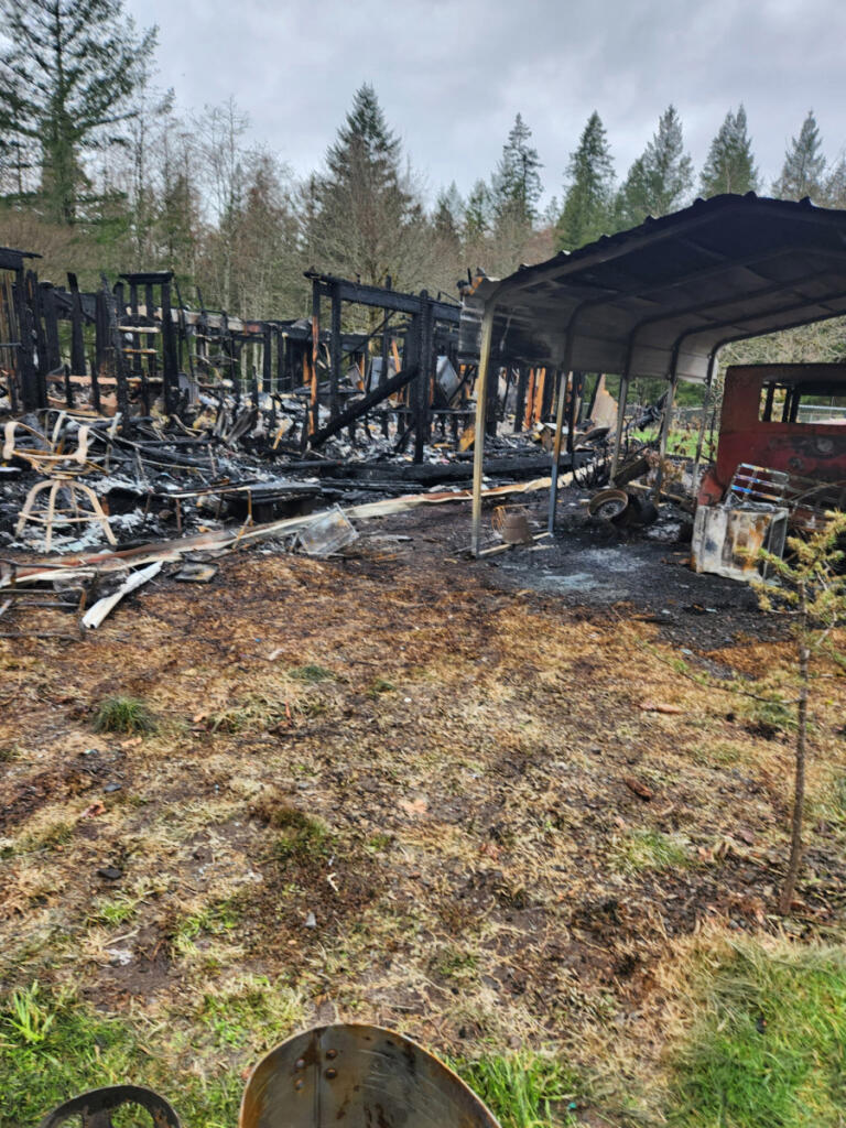 Husks of burned structures stand on Sherrill Morgan&rsquo;s Washougal area property after a March 10 fire. (Contributed by Sherrill Morgan)