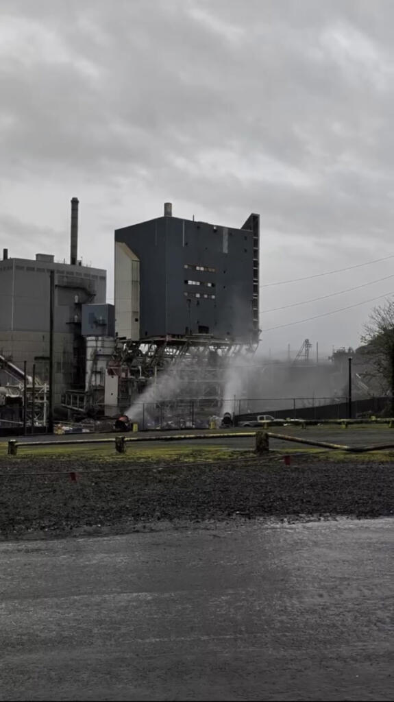 Contractors removed a recovery boiler using a controlled fall Wednesday morning at the Georgia-Pacific Camas Mill. A controlled fall involves cutting key structural components so heavy equipment can pull the building down, according to an email from Georgia-Pacific. Engineers spent months carefully planning the fall. &ldquo;The mill continues to employ about 150 people locally,&rdquo; according to Georgia-Pacific. &ldquo;The mill is not closing down, and we intend to continue operating it and employing people locally far into the future.&rdquo; (Photo stills from video contributed by Georgia-Pacific Camas Mill)