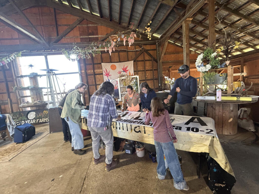A bevy of volunteers are busy as beavers working on projects and props for the Beaver Bash happening April 18 in Washougal. (Contributed by Valentina London)