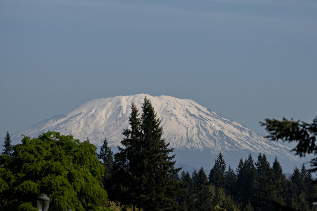 The top of Mount St. Helens is visible from Washington State University Vancouver on Wednesday morning. State officials have declared a statewide drought emergency due to low snowpack. (Amanda Cowan/The Columbian)