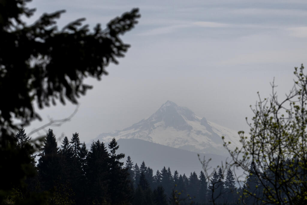 A hazy view of Mount Hood is barely visible from Washington State University Vancouver on Wednesday morning. (Amanda Cowan/The Columbian)