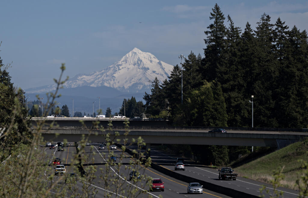 Mount Hood is visible along state Highway 14 on Wednesday afternoon. A state climatologist said this year&rsquo;s snowpack levels are the third lowest since records began in 1985.