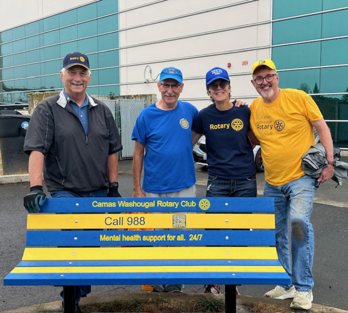 From left to right, Camas-Washougal Rotarians George Capacci, David Bussman, Kathy Bussman and Richard Renton stand behind a &ldquo;buddy bench&rdquo; at Discovery High School in Camas. (Contributed by George Capacci)