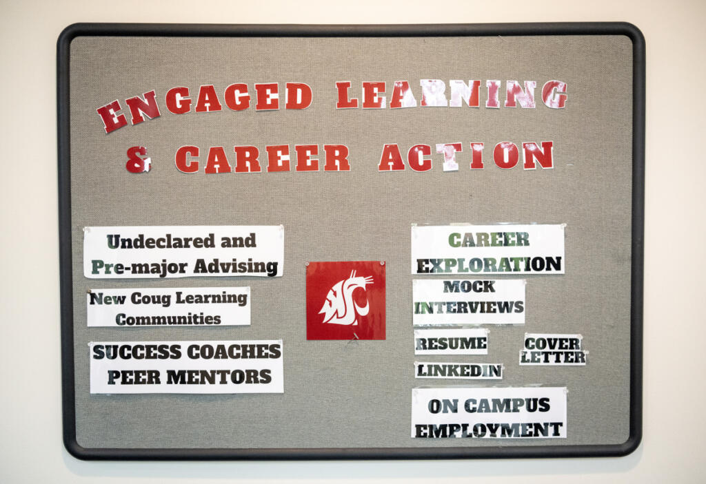 A sign hangs in the entryway of the Washington State University Vancouver Career Action Center on April 14.