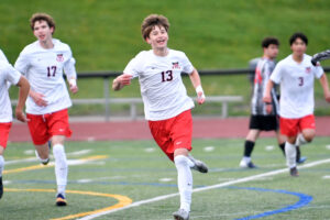 Mark Koroteyev (13) of Camas celebrates after scoring a goal against Union in the first half of a 4A Greater St. Helens League soccer match on Wednesday at Union High School. The Papermakers won the league opener 2-0. (Tim Martinez/The Columbian)