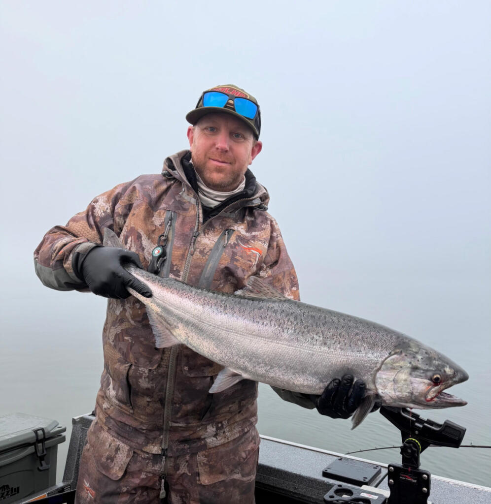 Fishing guide Casey Kelly of NW Columbia Fishing Adventures shows off a fine lower Columbia River spring Chinook he took earlier this year. The season reopener will give anglers a chance to land the finest table salmon to be found in the Columbia River. (Photo courtesy of Casey Kelly)