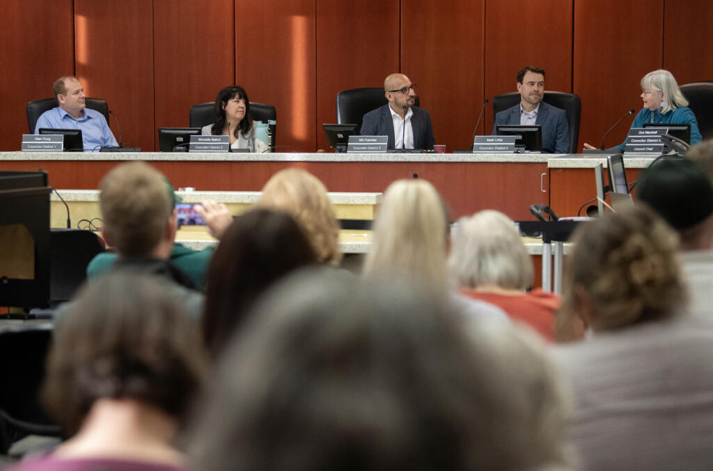 Clark County Council members Glen Yung, from left, Michelle Belkot, Wil Fuentes, Matt Little and Sue Marshall are pictured at the Public Service Center on Jan. 7, 2025. (Amanda Cowan/The Columbian file photos)
