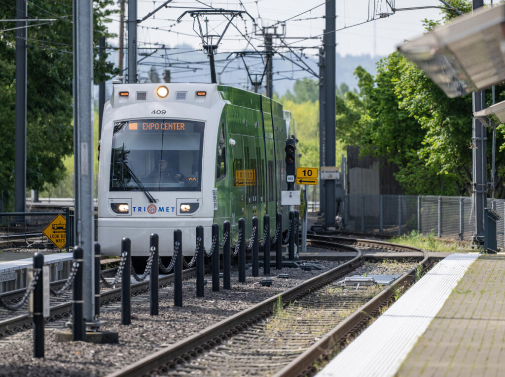 A yellow line MAX train pulls in May 1 at the Portland Expo Center MAX Station. (Taylor Balkom/The Columbian files)