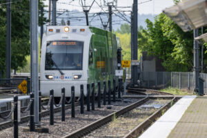 A yellow line MAX train pulls in May 1 at the Portland Expo Center MAX Station. (Taylor Balkom/The Columbian files)
