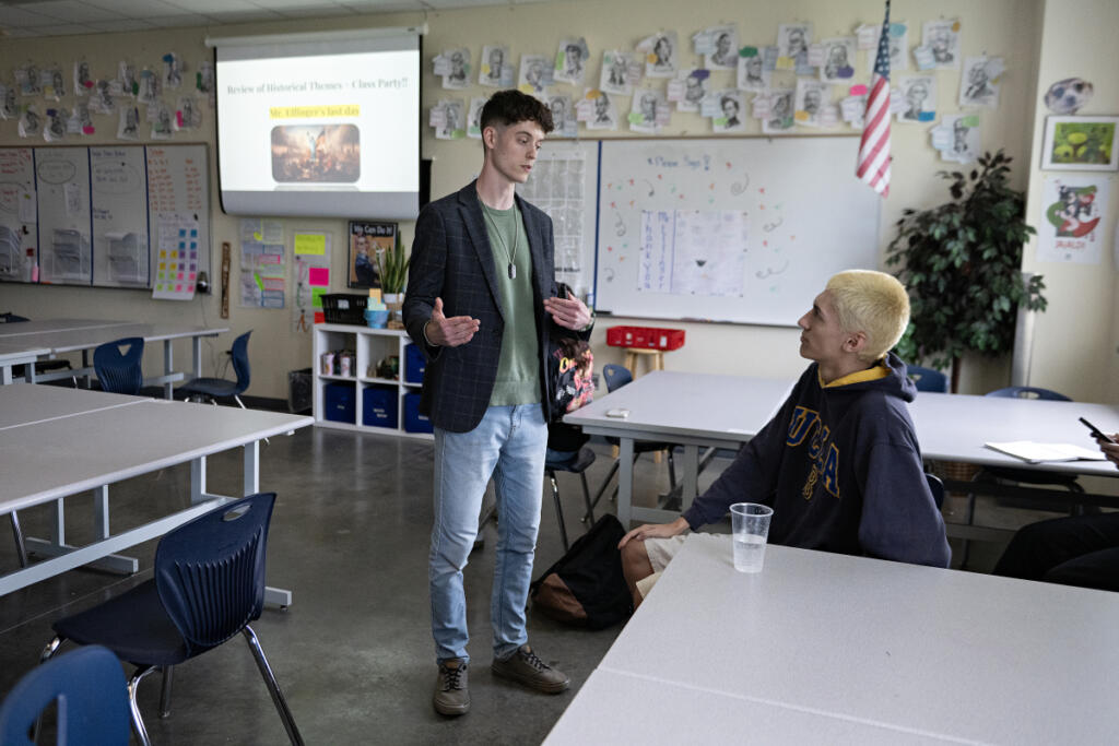 Student teacher Kyle Effinger, left, chats with junior Noah Kirk, 17, before class at Hockinson High School on Friday afternoon. Effinger will be among the teachers navigating the job market at a time when several local school districts are cutting positions. (Photos by Amanda Cowan/The Columbian)