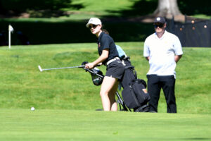 Addison Paul of Washougal putts from just off the 18th green during the Class 2A Greater St. Helens League girls golf tournament on Monday at Longview Country Club. (Micah Rice/The Columbian)