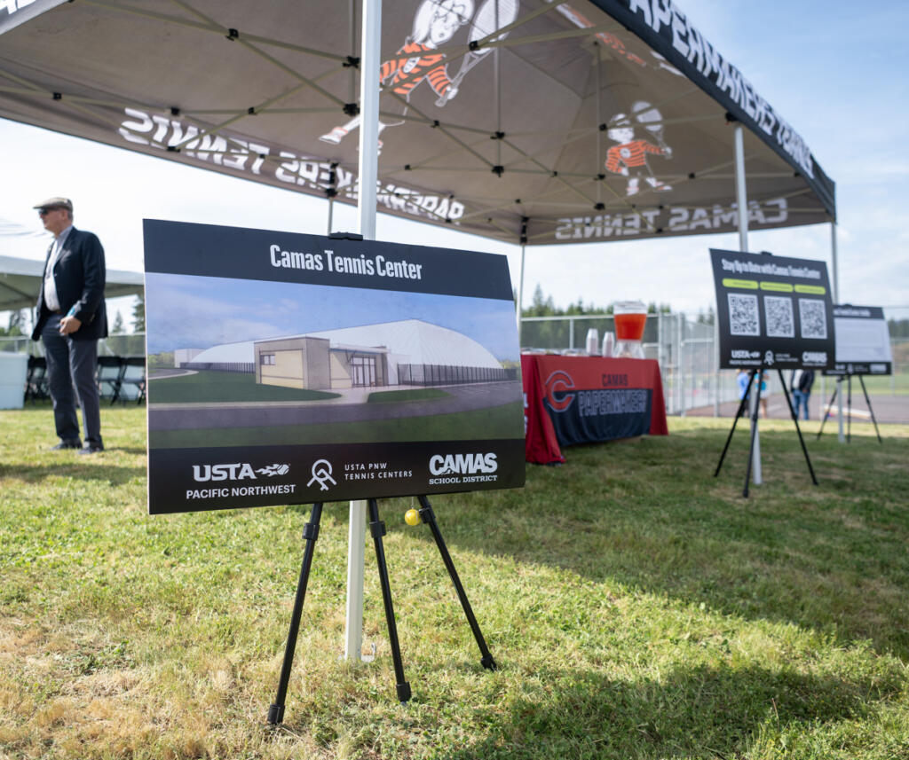 An easel displays a rendering during a groundbreaking for the Camas Tennis Center at Camas High School. (Taylor Balkom/The Columbian)