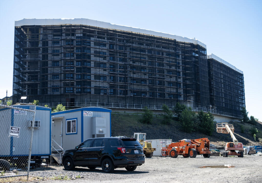 Construction continues Monday on the Ledges at Palisades  in east Vancouver. (Taylor Balkom/The Columbian)