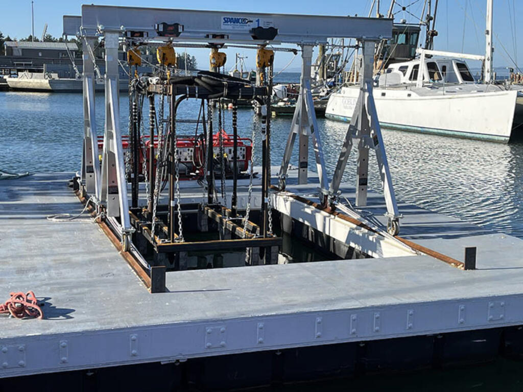 University of Washington researcher and biology professor Jennifer Ruesink used this custom floating platform to test subsurface vibration and surface pressure to reduce or eliminate the numbers of ghost shrimp in Willapa Bay. (Contributed by Jennifer Ruesink/University of Washington)