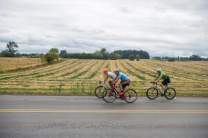 Bicyclists approach the Clark County Fire & Rescue Station 24 in Ridgefield in 2019 while riding the 68-mile Bike Around Clark County loop. Bicyclists chose from five route lengths offered by Ride Around Clark County and organized by the Vancouver Bike Club. (The Columbian file photos)