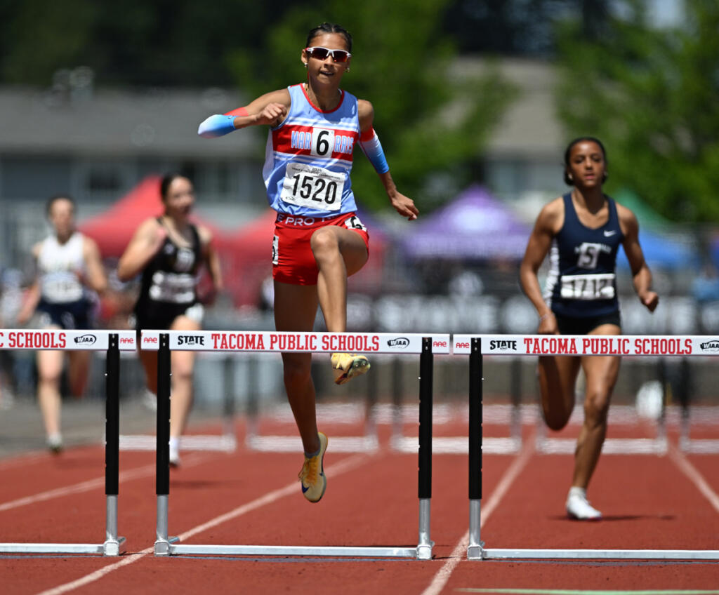 Mark Morris junior Elsie Herold wins the girls 2A 300 meter hurdles Saturday. Herold set a state meet record of 42.85.
