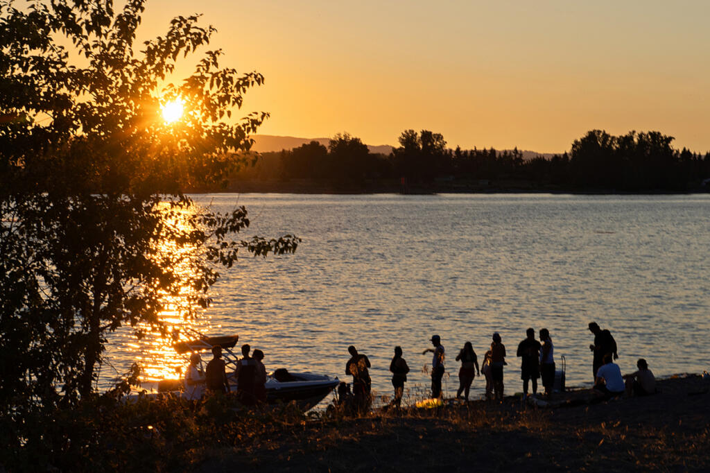 People pack the shoreline at Frenchman&rsquo;s Bar Regional Park on the last day of a summer heat wave on July 9, 2024. (amanda cowan/The Columbian files)