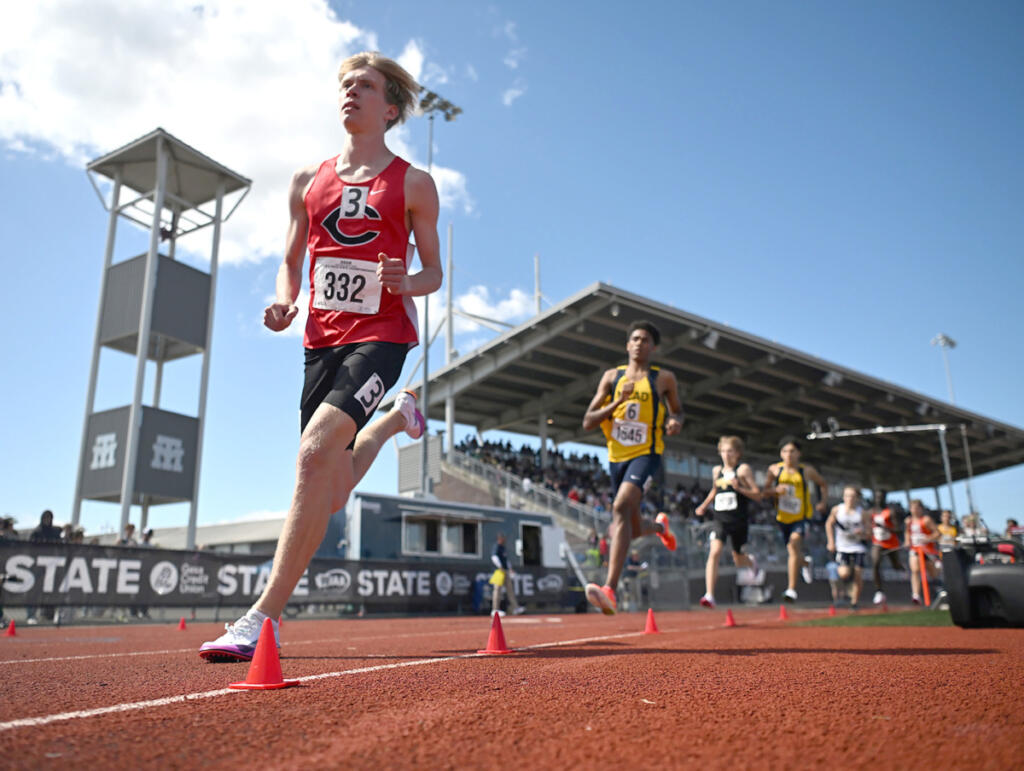 Camas senior Cohen Butler, left, runs the 4A boys 3200 meter race May 30 during the WIAA State Track and Field Meet at Mount Tahoma High School in Tacoma. (Photos by Taylor Balkom/The Columbian)