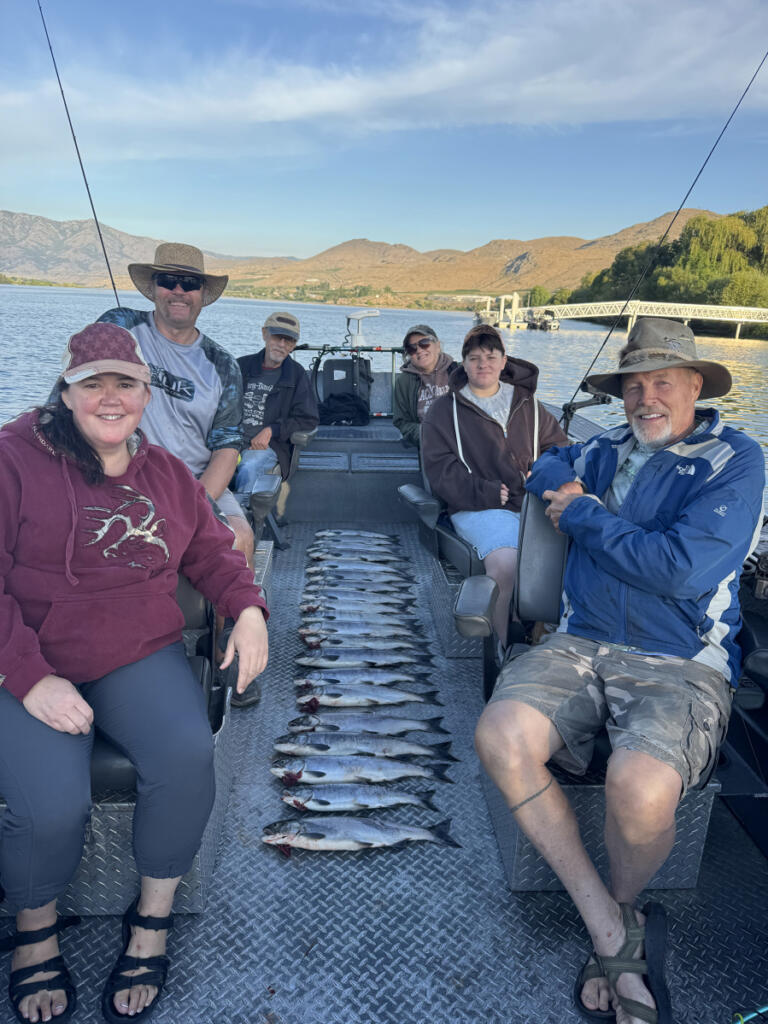 These anglers pose with a limit of sockeye taken in the Brewster Pool. There is concern among sockeye anglers that the deadly warm waters of the Columbia that killed three quarters of the sockeye run in 2015 may return this summer. (Photo by Brad Wagner)