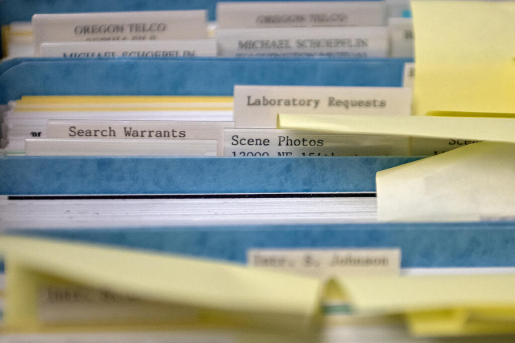 Clark County Sheriff&rsquo;s Office Cold Case Unit investigators start their work by poring over files. (Amanda Cowan/The Columbian)