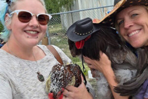 Attendees pose with their chickens during the 2025 Chicken Fashion Show. (Contributed by Jordana LaSalle)