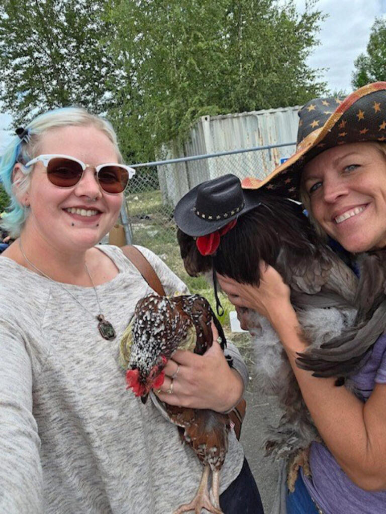 Attendees pose with their chickens during the 2025 Chicken Fashion Show. (Contributed by Jordana LaSalle)