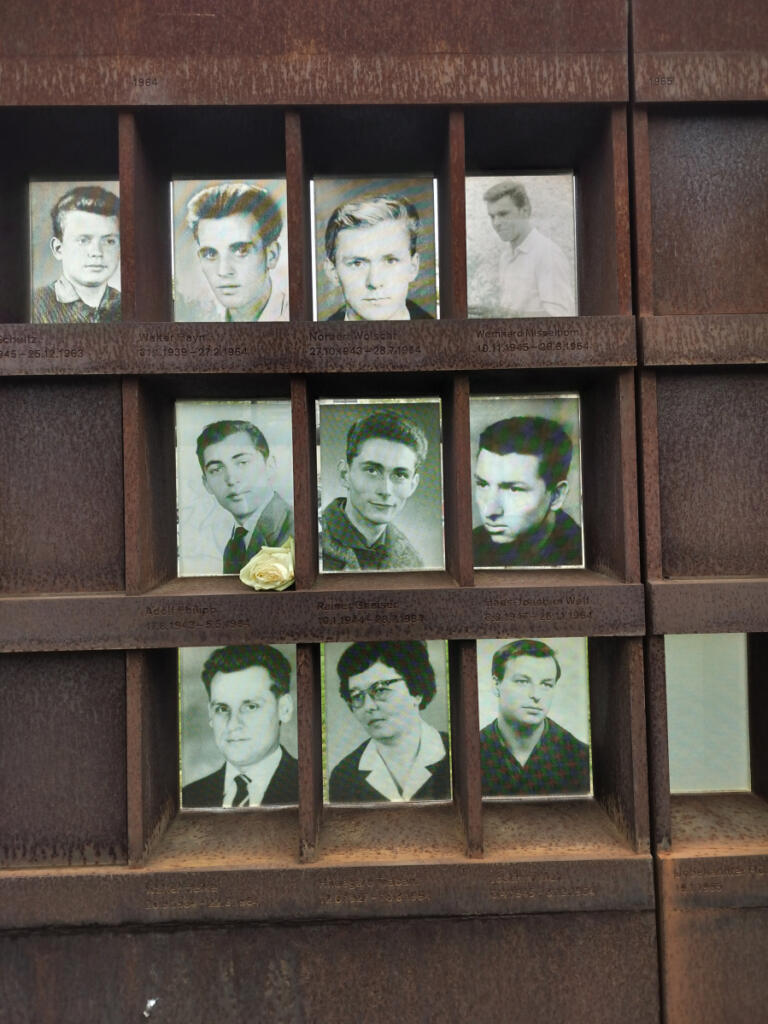 A display memorializes a few of the approximately 140 East Berliners who died trying to cross the Berlin Wall into West Berlin.