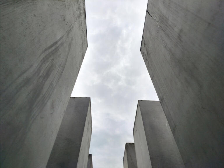 A view of the sky from inside the Memorial to the Murdered Jews of Europe, an assemblage of thousands of concrete blocks and pillars that occupies 4.5 acres of central Berlin.