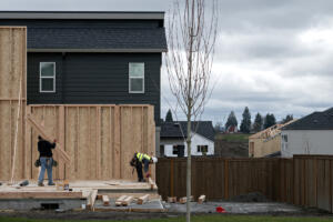 Homes at various stages of construction are seen in the Harmony Heights neighborhood in February. A new report from the National Association of Home Builders showed that buying a new house is out of reach for more than 8 out of 10 Vancouver households. (Amanda Cowan/The Columbian files)
