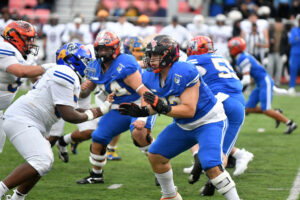 Cody Jacobus of Washougal (right), playing for Team Columbia, blocks Elijah Green of Grant, playing for Team Willamette, during the 2026 Les Schwab Bowl high school football all-star game at Lewis & Clark College in Portland on June 27. (Photos by Tim Martinez/The Columbian)