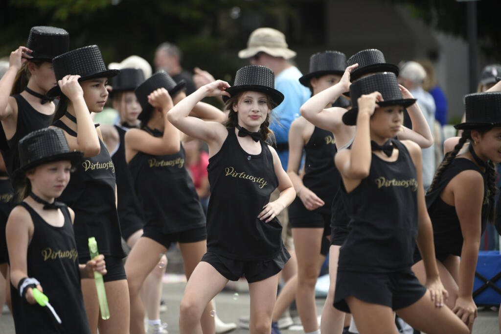 Dancers from Virtuosity Dance at VEGA perform July 26, 2025, in the Camas Days Grand Parade in downtown Camas. (Tim Martinez/The Columbian)